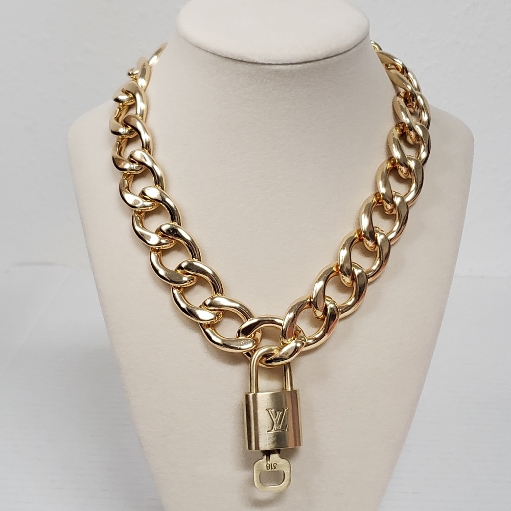 Authentic Louis Vuitton Padlock Gold Pendant W/ Geometry Cuban Style Chain